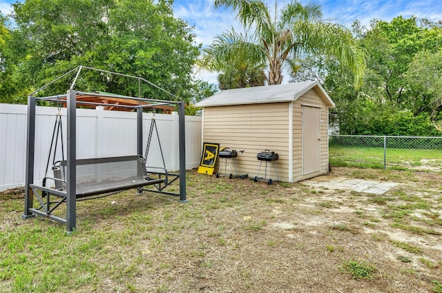 520 Dora Ave, Tavares, FL 32778 - fenced backyard featuring a shed and a gazebo