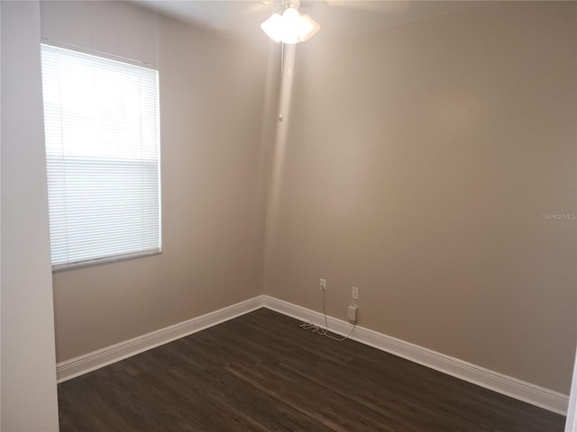 222 Bacopa Pass, Davenport, FL 33897 - unfurnished room with dark wood-style flooring and a ceiling fan