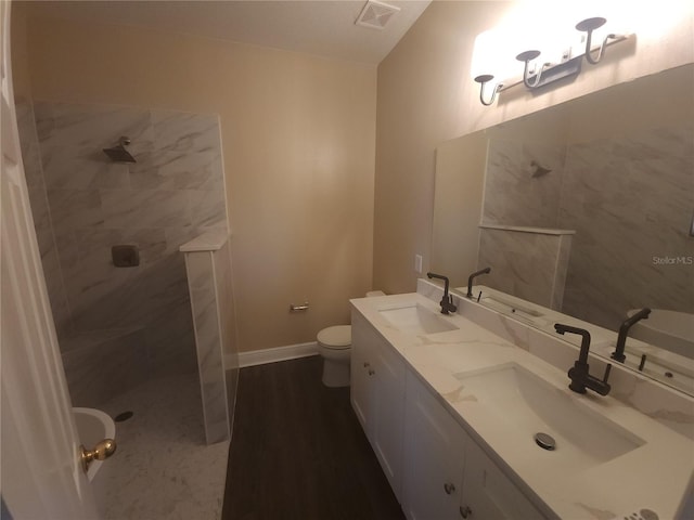 222 Bacopa Pass, Davenport, FL 33897 - bathroom featuring walk in shower and double vanity