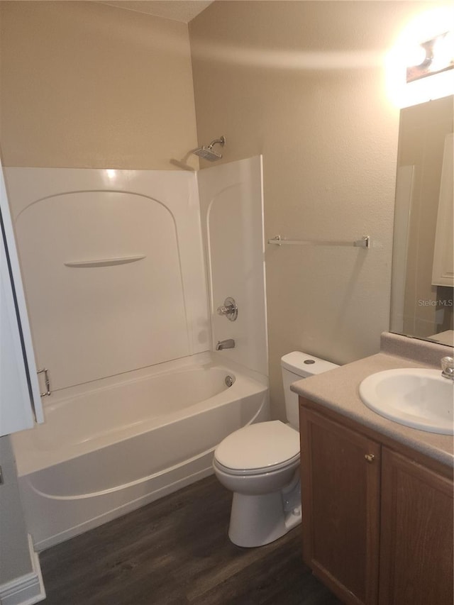 222 Bacopa Pass, Davenport, FL 33897 - full bath featuring vanity, wood finished floors, and  shower combination