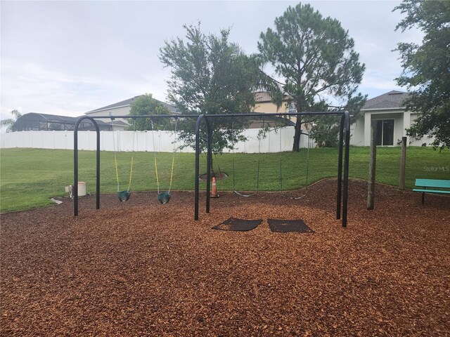 222 Bacopa Pass, Davenport, FL 33897 - communal playground with a lawn