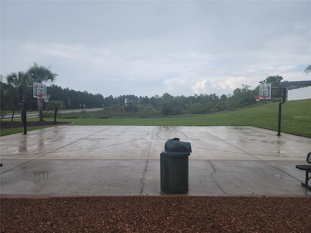 222 Bacopa Pass, Davenport, FL 33897 - view of basketball court with community basketball court and a yard