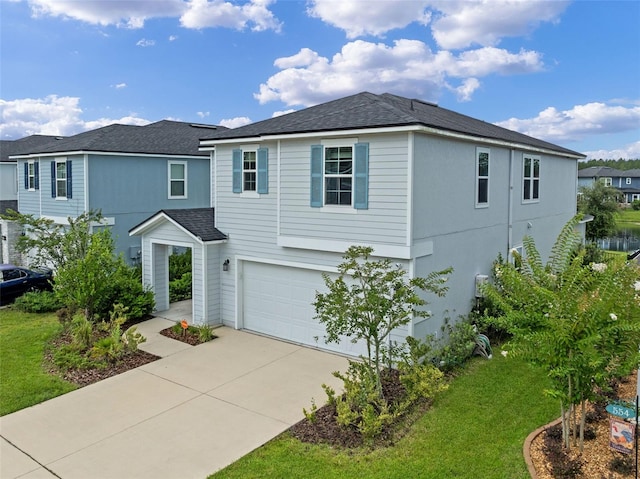562 Meadow Ridge Dr, Saint Augustine, FL 32092 - view of front of home with driveway, a garage, a front lawn, and roof with shingles