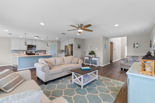 562 Meadow Ridge Dr, Saint Augustine, FL 32092 - living room featuring dark wood finished floors, recessed lighting, and ceiling fan