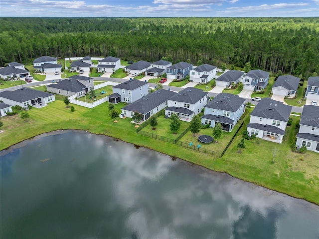 562 Meadow Ridge Dr, Saint Augustine, FL 32092 - aerial view of residential area featuring a heavily wooded area and a large body of water
