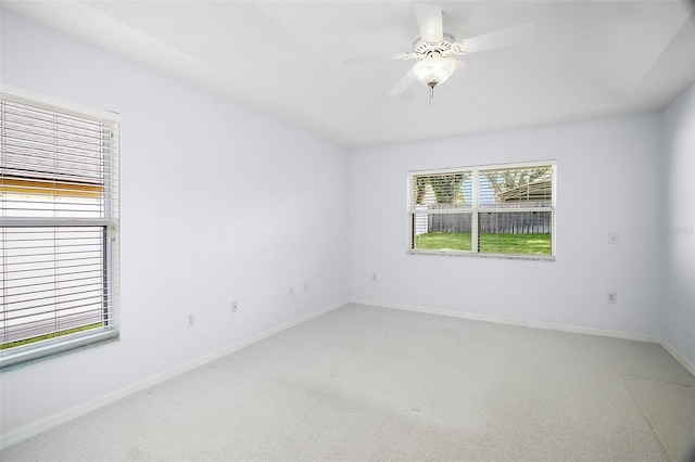 33234 Kaylee Way, Leesburg, FL 34788 - spare room featuring light colored carpet and a ceiling fan