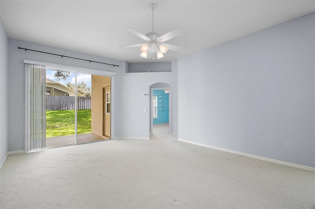 33234 Kaylee Way, Leesburg, FL 34788 - carpeted spare room featuring arched walkways and ceiling fan