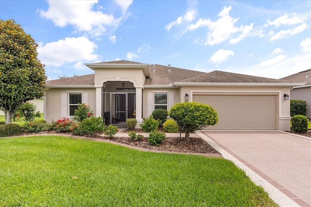 4210 Arlington Ridge Blvd, Leesburg, FL 34748 - view of front of house with an attached garage, stucco siding, a front yard, concrete driveway, and a shingled roof