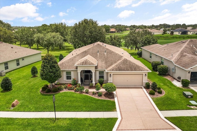 4210 Arlington Ridge Blvd, Leesburg, FL 34748 - view of front of house featuring an attached garage, stucco siding, driveway, and a front lawn