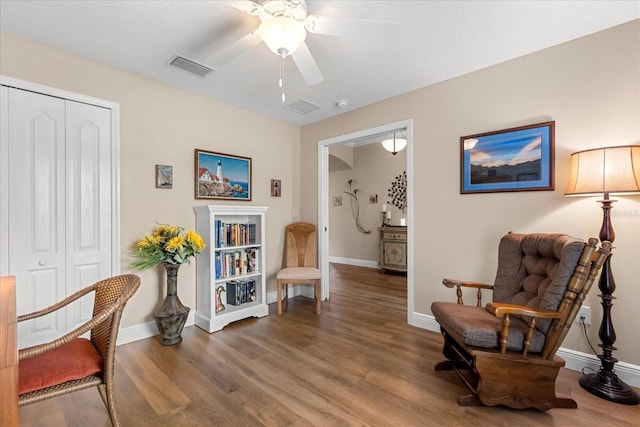 4210 Arlington Ridge Blvd, Leesburg, FL 34748 - sitting room with ceiling fan and wood finished floors