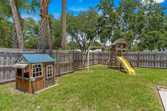 204 Lori Ct, Umatilla, FL 32784 - fenced backyard featuring a playground