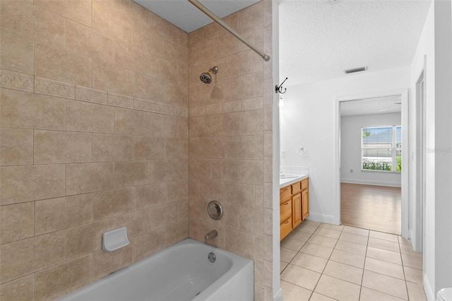 204 Lori Ct, Umatilla, FL 32784 - full bathroom featuring tile patterned floors, shower / washtub combination, and vanity
