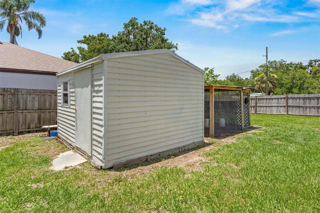 204 Lori Ct, Umatilla, FL 32784 - view of shed with a fenced backyard