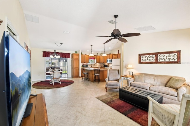 3460 Idlewood Loop, The Villages, FL 32162 - living room featuring ceiling fan, lofted ceiling, light tile patterned flooring, a chandelier, and recessed lighting