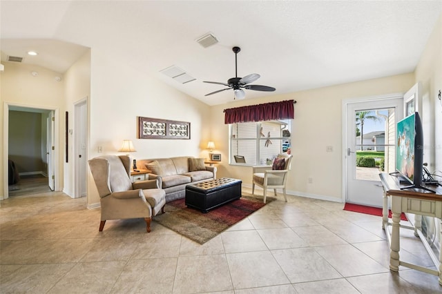 3460 Idlewood Loop, The Villages, FL 32162 - living room with vaulted ceiling, a ceiling fan, and light tile patterned floors