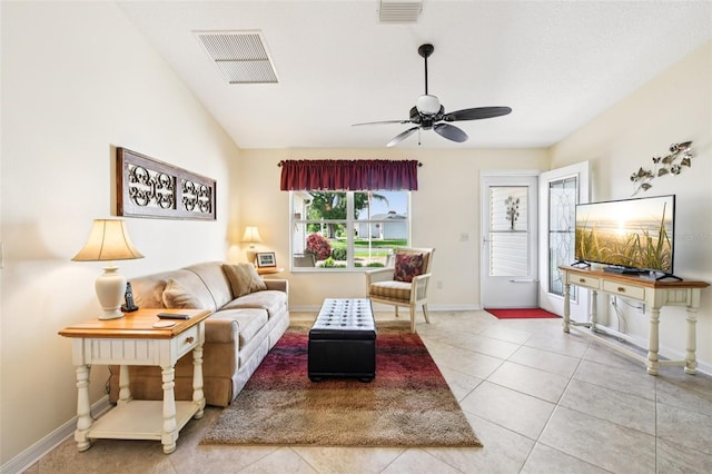 3460 Idlewood Loop, The Villages, FL 32162 - living area with ceiling fan and light tile patterned flooring