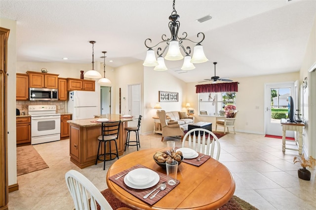 3460 Idlewood Loop, The Villages, FL 32162 - dining space with light tile patterned floors, a ceiling fan, and recessed lighting