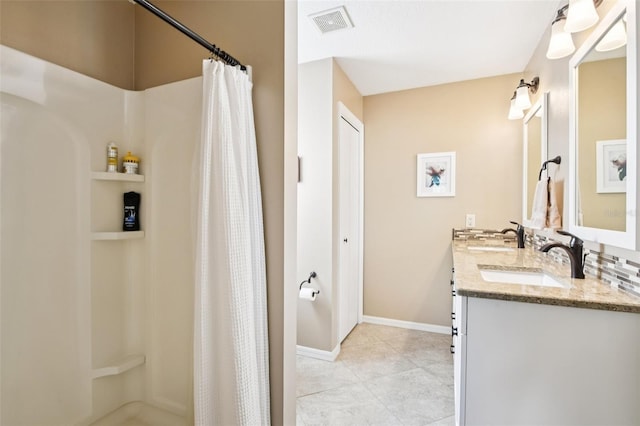 3460 Idlewood Loop, The Villages, FL 32162 - bathroom featuring double vanity and a shower with shower curtain
