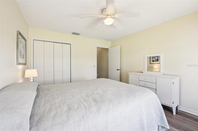 3460 Idlewood Loop, The Villages, FL 32162 - bedroom with dark wood-type flooring, a closet, and ceiling fan