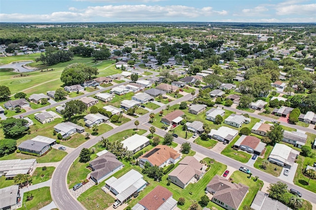 703 Royal Palm Ave, Lady Lake, FL 32159 - aerial perspective of suburban area featuring a local golf course