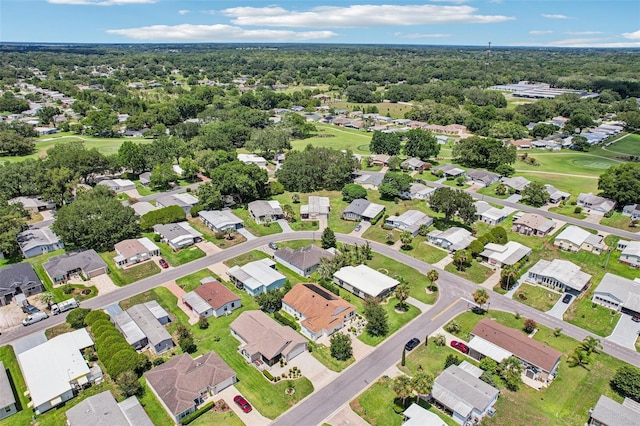 703 Royal Palm Ave, Lady Lake, FL 32159 - aerial perspective of suburban area featuring a golf course