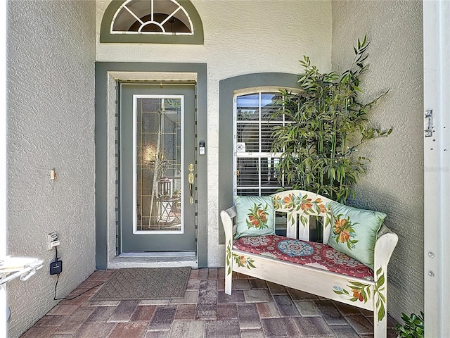 3716 Eversholt St, Clermont, FL 34711 - view of exterior entry with stucco siding
