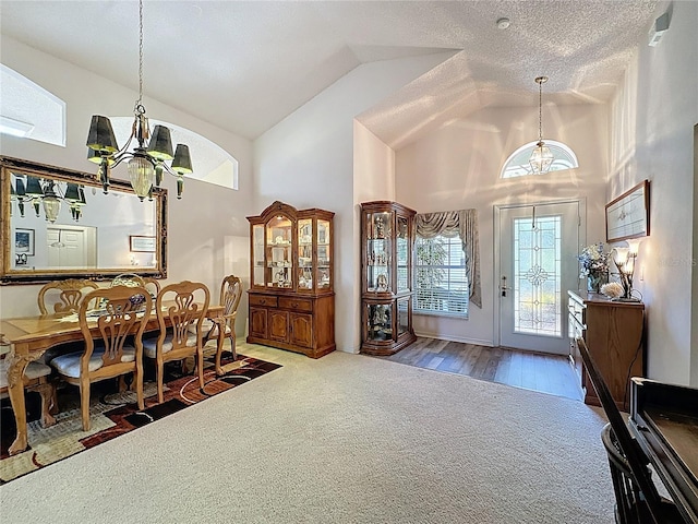 3716 Eversholt St, Clermont, FL 34711 - dining area with a chandelier, carpet floors, and high vaulted ceiling
