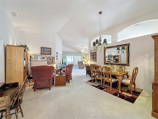 3716 Eversholt St, Clermont, FL 34711 - carpeted dining space with lofted ceiling and a chandelier