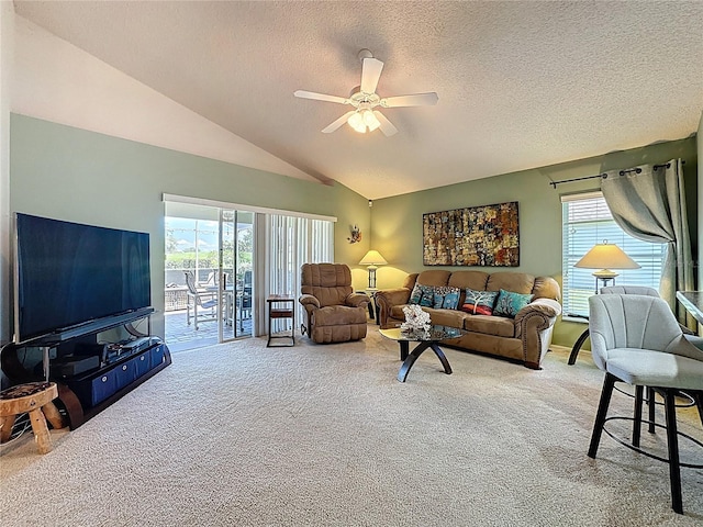 3716 Eversholt St, Clermont, FL 34711 - living room featuring carpet flooring, a ceiling fan, healthy amount of natural light, a textured ceiling, and lofted ceiling