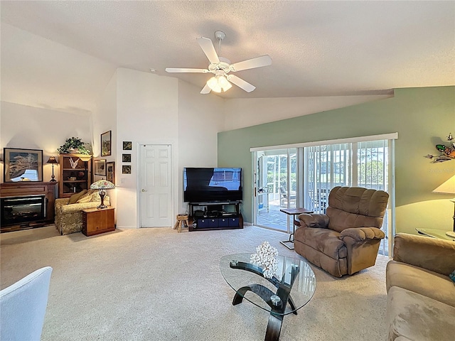 3716 Eversholt St, Clermont, FL 34711 - carpeted living room with ceiling fan, high vaulted ceiling, and a textured ceiling