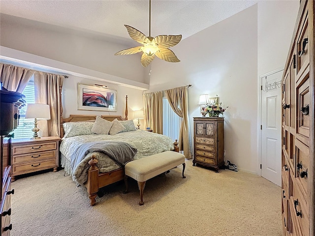 3716 Eversholt St, Clermont, FL 34711 - bedroom with light carpet, a textured ceiling, a ceiling fan, and high vaulted ceiling