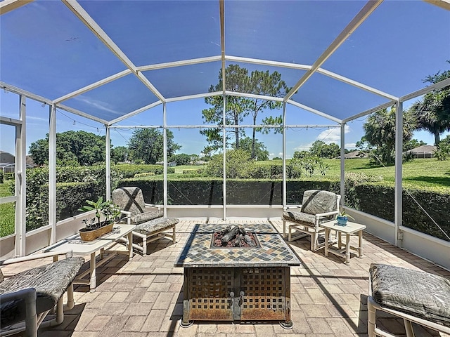 3716 Eversholt St, Clermont, FL 34711 - view of patio / terrace featuring glass enclosure and an outdoor living space with a fire pit