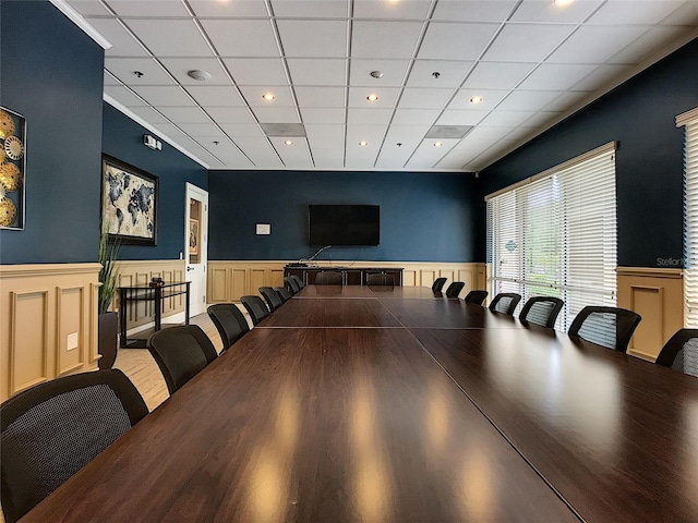 3716 Eversholt St, Clermont, FL 34711 - unfurnished dining area with a wainscoted wall, a paneled ceiling, a decorative wall, recessed lighting, and wood finished floors