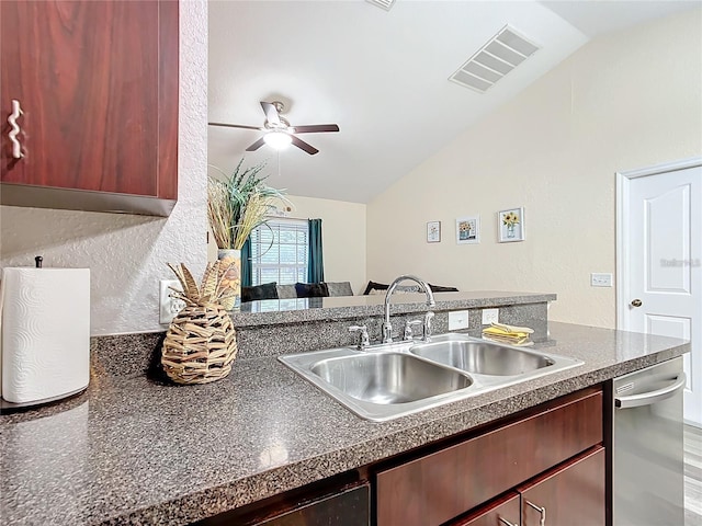 12181 SE 87th Ct, Belleview, FL 34420 - kitchen with lofted ceiling, stainless steel dishwasher, a textured wall, ceiling fan, and dark brown cabinets