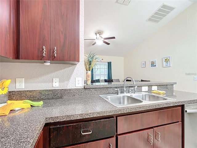 12181 SE 87th Ct, Belleview, FL 34420 - kitchen featuring lofted ceiling, stainless steel dishwasher, a ceiling fan, and a textured wall