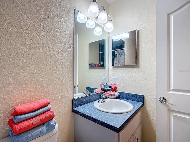 12181 SE 87th Ct, Belleview, FL 34420 - full bathroom featuring a textured wall and vanity