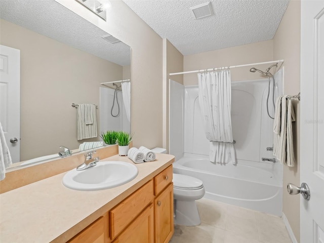 2369 Five Forks Trl, The Villages, FL 32162 - full bathroom featuring vanity, shower / bathtub combination with curtain, a textured ceiling, and tile patterned floors