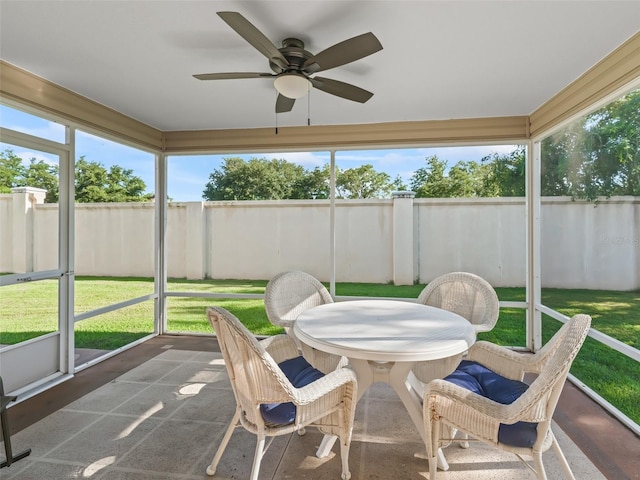 2369 Five Forks Trl, The Villages, FL 32162 - sunroom featuring a ceiling fan, outdoor dining space, and plenty of natural light