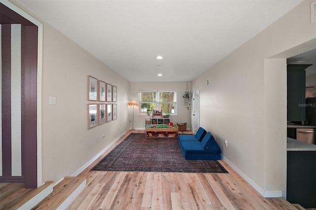 126 E Beach St, Groveland, FL 34736 - unfurnished room with wood finished floors and recessed lighting