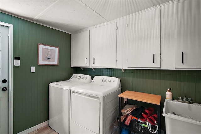 126 E Beach St, Groveland, FL 34736 - washroom featuring separate washer and dryer and cabinet space