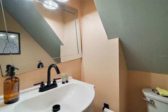 126 E Beach St, Groveland, FL 34736 - half bathroom with a sink and toilet