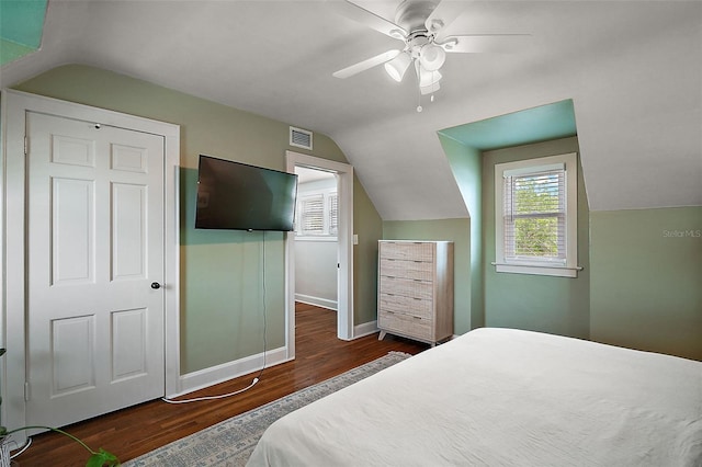 126 E Beach St, Groveland, FL 34736 - bedroom with vaulted ceiling, wood finished floors, and ceiling fan