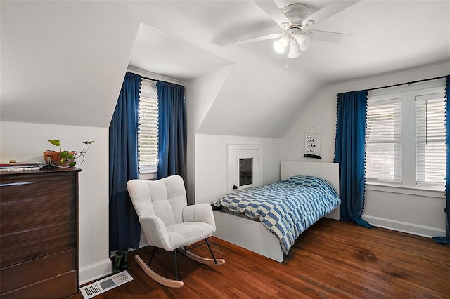 126 E Beach St, Groveland, FL 34736 - bedroom with vaulted ceiling, wood finished floors, multiple windows, and a ceiling fan