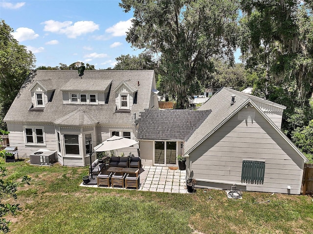 126 E Beach St, Groveland, FL 34736 - rear view of property with an outdoor hangout area, a patio, and a shingled roof