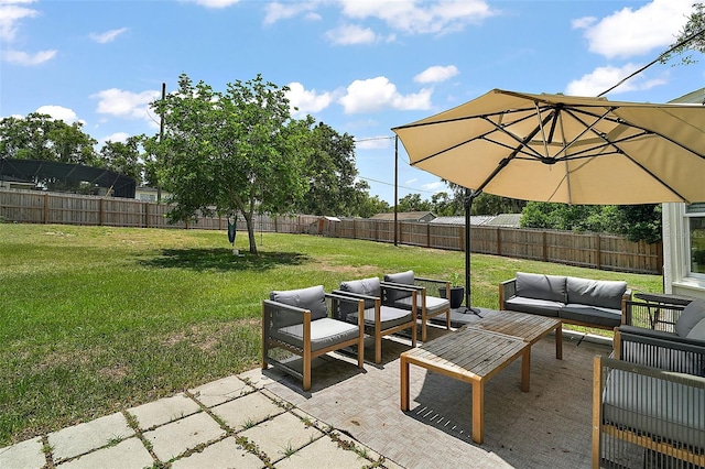 126 E Beach St, Groveland, FL 34736 - fenced backyard featuring an outdoor hangout area and a patio