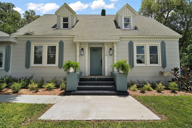 126 E Beach St, Groveland, FL 34736 - view of cape cod house
