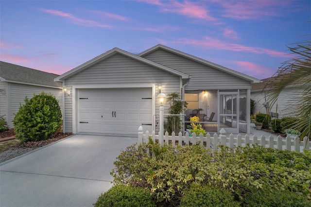2237 Jetta Way, The Villages, FL 32162 - ranch-style house with concrete driveway, an attached garage, and a sunroom