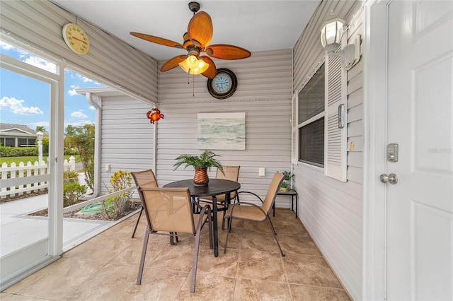 2237 Jetta Way, The Villages, FL 32162 - sunroom / solarium with ceiling fan and outdoor dining area