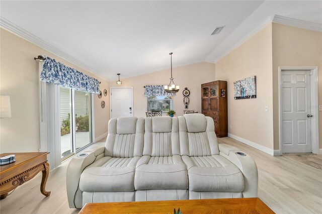 2237 Jetta Way, The Villages, FL 32162 - living room featuring lofted ceiling, light wood-type flooring, crown molding, and a chandelier