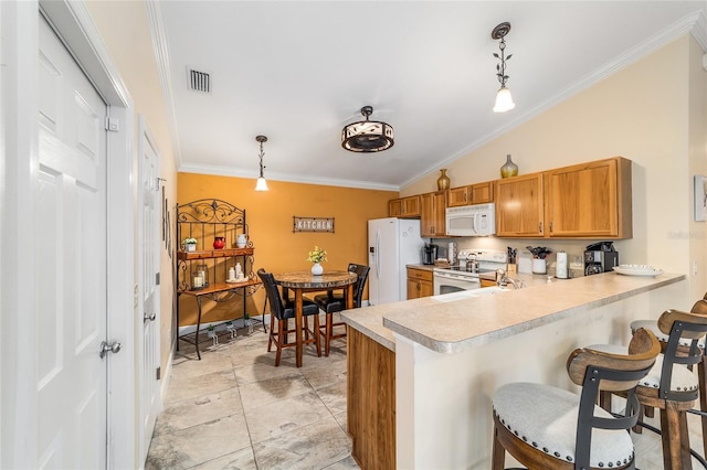 2237 Jetta Way, The Villages, FL 32162 - kitchen with white appliances, light countertops, ornamental molding, brown cabinets, and pendant lighting